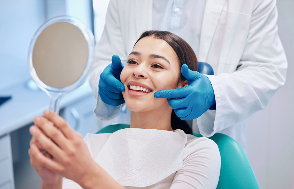 Patient Admiring Her New Tooth Filling