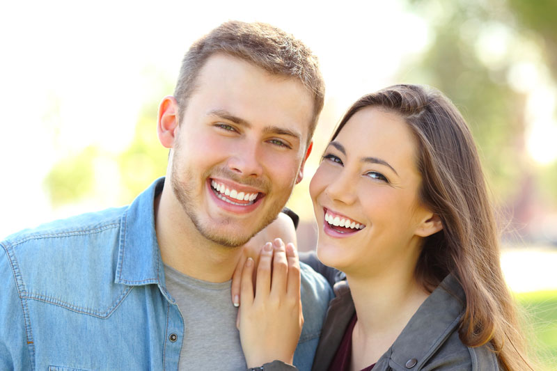Happy Couple Smiling After Teeth Whitening In Mississauga, ON