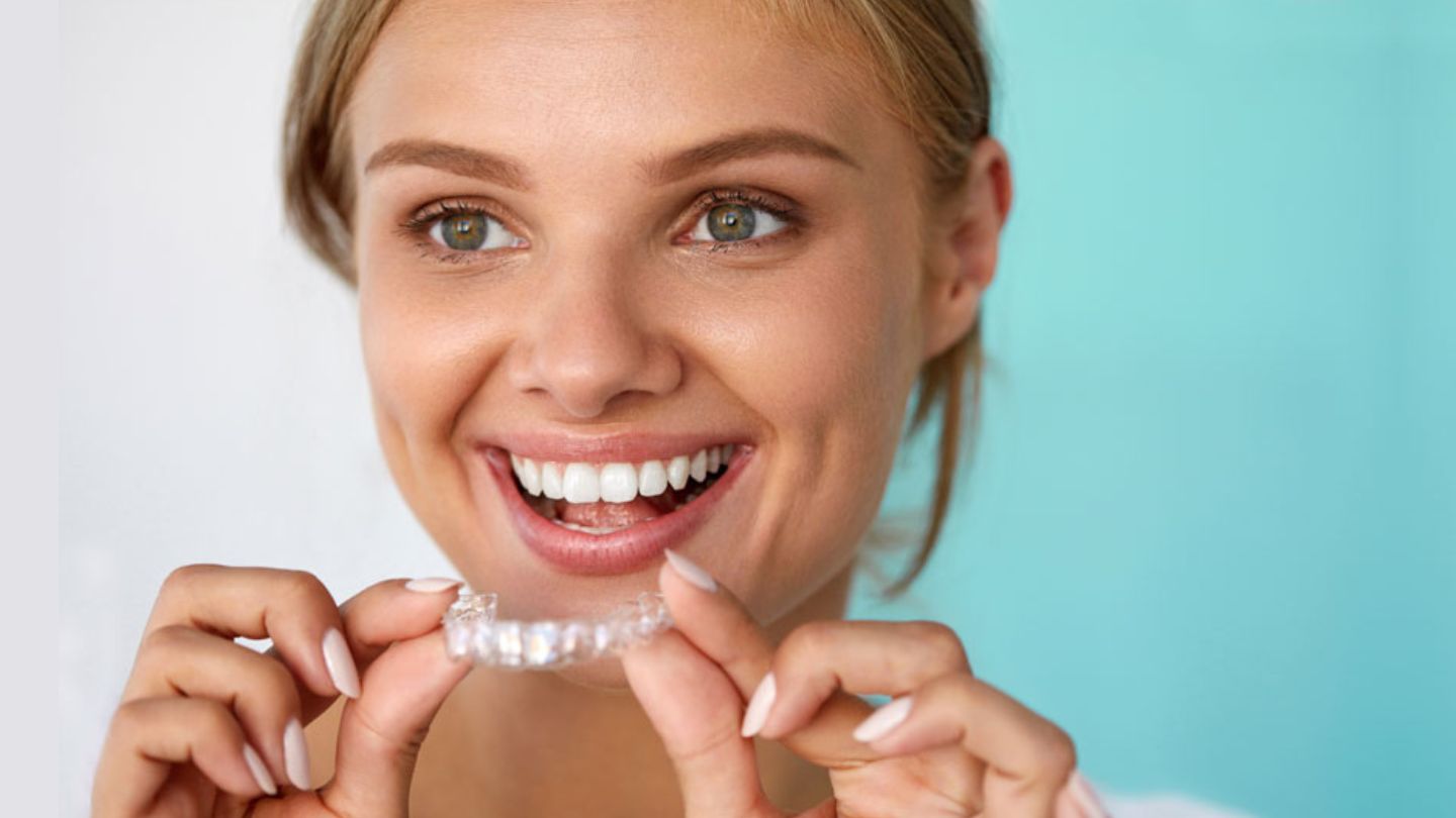 Woman Holding An Invisalign