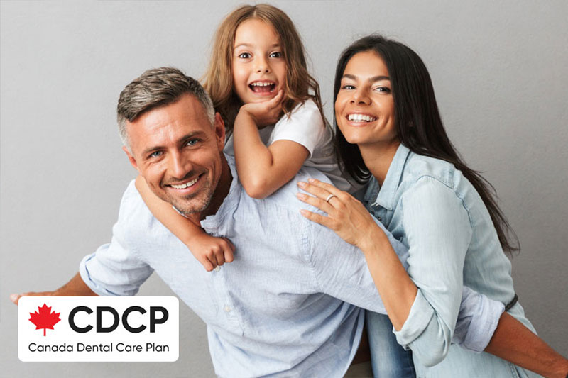 Family Smiling Together with Child on Parent's Back