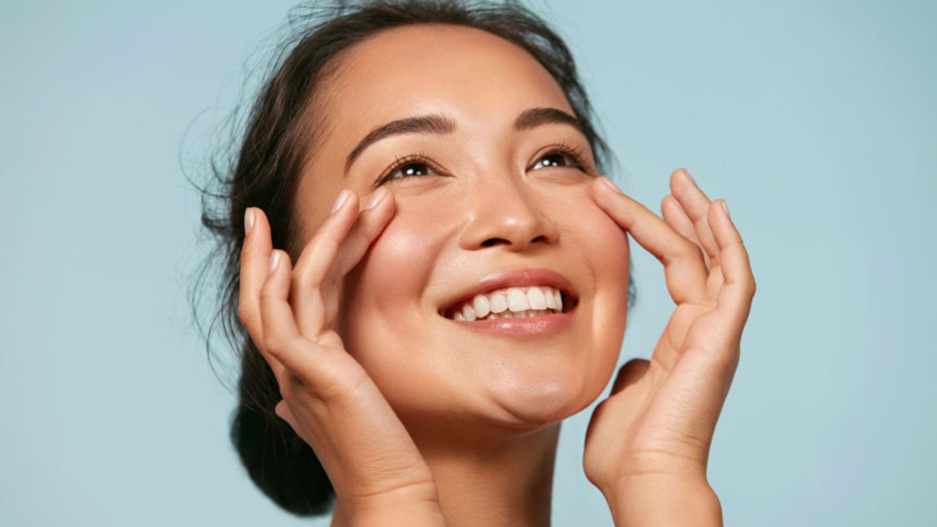 Smiling Woman Showing Healthy Teeth